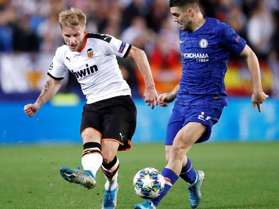 Danske Daniel Wass (tv) i aktion for Valencia i en Champions League-kamp mod Chelsea i november. | Foto: Andrew Boyers/Reuters/Ritzau Scanpix