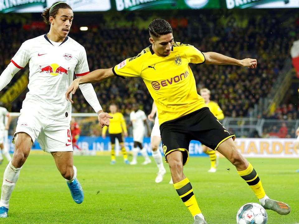 Den danske landsholdsspiller Yussuf Poulsen (tv) i aktion for sin tyske klub RB Leipzig i en kamp mod Borussia Dortmund i december 2019. | Foto: Leon Kuegeler/Reuters/Ritzau Scanpix